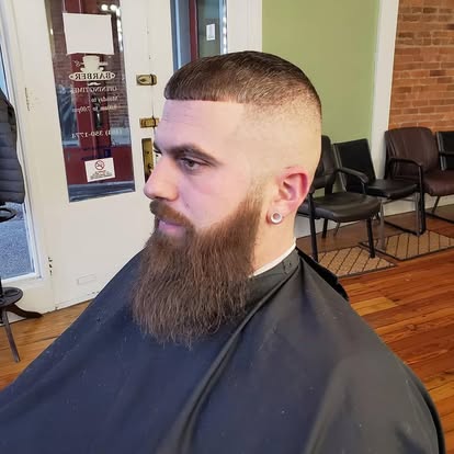 Short haircut paired with a long beard