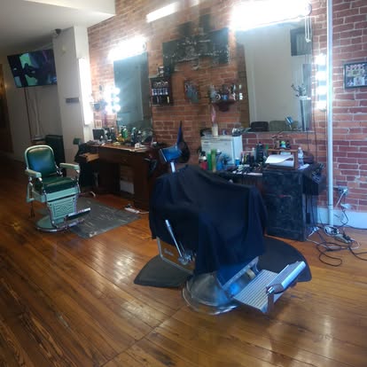 Barber stations and vintage chairs at Masters